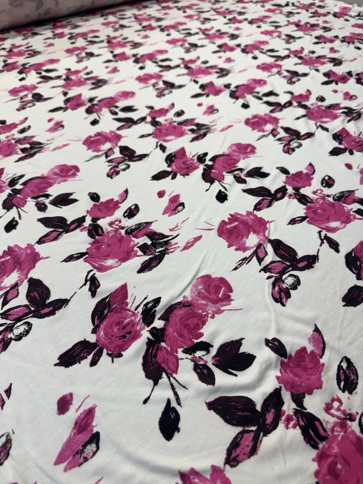 Ivory Floral Spun Polyester Jersey Fabric – Magenta Rose Print 150cm